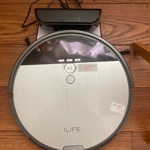 A Roomba vacuum plus mop